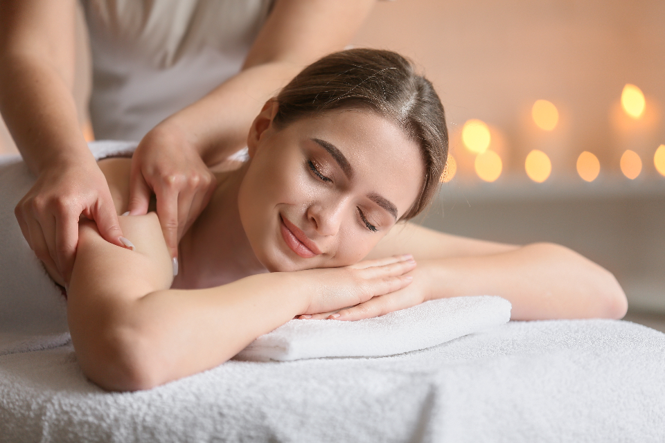 A therapist performing soft-tissue therapy
