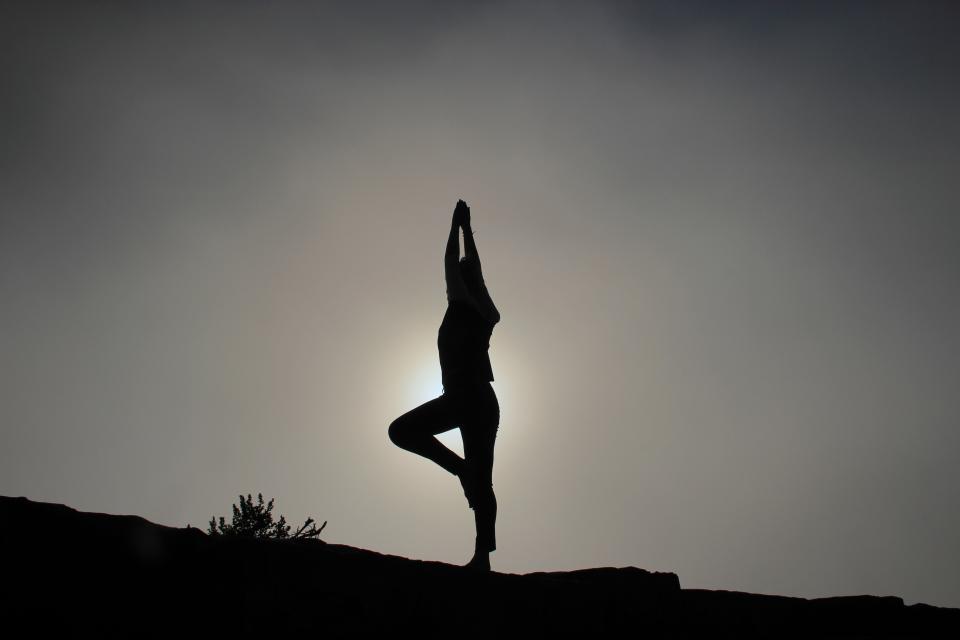 A person practicing yoga